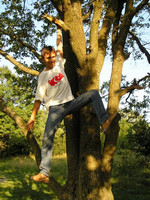 2004.08.06 Hanging on a tree in the Druzhby Park.