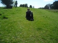 2014.04.09 Great Britain. Sitting on bright grass of an English hill and pasture.