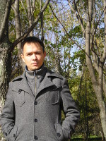 2015.10.04 Autumn portrait with still green trees in the background 
© 2015 My son Ratmir.