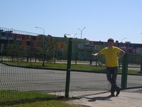 2017.05.01 At the fence hiding the name of the colored building – “Innopolis International School” (Innopolis, Tatarstan, Russia).