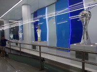 2021.07.11 At Saint Petersburg's “Zenit” metro station with the cups of the football club of the same name, a diagonal view from the right.
