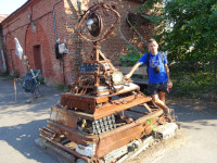 2021.07.11 With one more couple of exhibits of a street exhibition of scrap metal handicrafts in Kronstadt, first of all, with the sign of Shambhala, or the “Eye of Providence” of Freemasons.