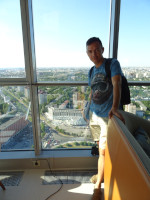 2021.07.12 Standing by the panoramic windows of the “Floor 41” restaurant  of Peter's skyscraper “Leader Tower”, a full-length view of me and Saint Petersburg from the height of 150 meters.