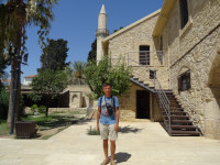2021.08.02 In the yard of the Larnaca Medieval Fort (Κάστρο Λάρνακας) with a view to the minaret of the Grand Mosque (المسجد الكبير) of Larnaca outside the fort's walls.