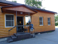 2021-07-12. С каким-то продовольственным магазином рядом с Петровской церковью, но не помню, зачем: то ли она в том же деревянном стиле, то ли я там пирожок купил. 😊