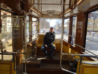 2022-03-17. Inside a tram (this time a real one) of Nizhny Novgorod (Russia), on a wooden seat for 1.5 people. 😊