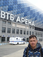 2022-04-30. A close-up portrait against the background of the home stadium of the blue-and-white “Dynamo” under the name of (its sponsor bank) “VTB Arena”, though inside it is the Central Stadium of “Dynamo” named after Lev Yashin.