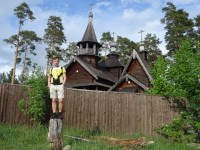 2022-06-05. The wooden Trinity Church in the village of Talitsy in the Pereslavsky district of the Yaroslavl region was closed by a high fence, so I had to “grow up” a little. 😊