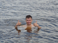 2022-06-10. I am showing that the water in the Oka (on a Murom beach) on June 10 is 👍, though the facial expressions give a little away that it is cold. 😁