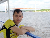 2022-06-10. Sailing on a pleasure boat to the Murom Bridge, a general plan from afar.
