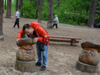 2022-06-19. There were several wooden sculptures of mushrooms in the “Fairy Tale” Park in Gus-Khrustalny (the Vladimir region, Russia) but for some reason I decided to try to eat this one, dissatisfied.