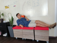 2022-07-01. With an “Inreco LAN” thermocup won in some kind of corporate competition: I am lying and checking if I have drunk everything. 🧐
