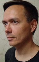 2022-07-11. A black rocker with a (pseudo)earring in his ear. 🤘