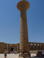 2022-08-21. 1st of 2 photographs with the same column of the Karnak Temple (Ipt-swt) complex, a diagonal view towards the mutton-like sphinxes.