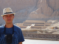 2022-08-21. Against the background of the Mortuary Temple of Hatshepsut, a close-up.