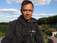 2022-09-11. Looking too tanned for the amazingly beautiful yard/garden of the Savior Transfiguration Male Monastery in Murom, Vladimir region, Russia.