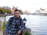2022-10-09. On the Old Pregola embankment with a view to the Jubilee Bridge, the lighthouse, the synagogue and the “Fish Village” in Kaliningrad (Königsberg), Russia.