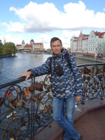 2022-10-09. On the Jubilee Bridge with a view to the lighthouse, the synagogue and the “Fish Village” in Kaliningrad (Königsberg), Russia.
