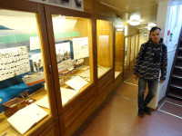 2022-10-09. I have just gone down the stairs (at the right) into the museum rooms of the medium-sized fishing trawler SRT-129, moored on the Pregola river by the Museum of the World Ocean in Kaliningrad (Königsberg), Russia.