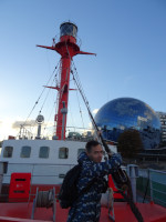 2022-10-09. I am trying to keep the tilted mast of the “Irbensky” floating lighthouse from falling further onto the glass ball of the Museum of the World Ocean in Kaliningrad (Königsberg), Russia.