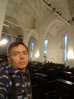 2022-10-10. Not very clear but almost the only photograph of me in the Königsberger Cathedral (Königsberger Dom) before an organ concert.