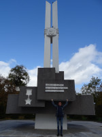 2022-10-11. I am supporting the monument to the Komsomol heroes who died during the storming of Königsberg in April of 1945, under the inscription that in Russian says, “Defying death, you went into battle for the happiness of the Motherland.”