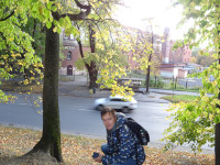 2022-10-11. Squatting on the (Lithuanian) rampart, and in the background there is a branch of MGUTU, the Kaliningrad Cossack Institute of Technology and Design, but the building itself is better known as the Kronprinz defensive barracks.