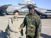 2005.08.20 The son of a Russian pilot handshaking an Amercian pilot.