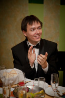 2011.12.26 Applauding to somebody at the company's celebration of the New Year 2012. 
© 2011 Sergey Lakeev