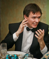 2011.12.26 Looking aggressive while emotionally explaining something at the company's celebration of the New Year 2012. 
© 2011 Sergey Lakeev