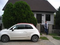 /201.60.91 At an Austrian private house with a little land plot and a little Fiat 500.