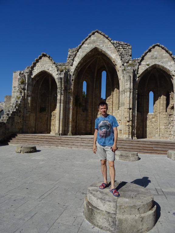 2019.05.31 Against the background of the Church of the Virgin of the Burgh in the city of Rhodes.
