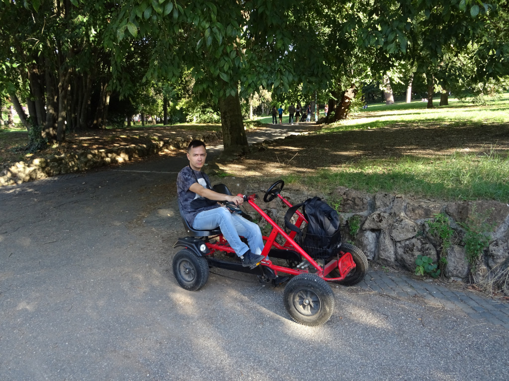 2019.10.04 Passenger-“engine” of a 2-seat bicycle cart (the 2nd, driver, is taking the picture) in the park of Villa Borghese (Rome, Italy).