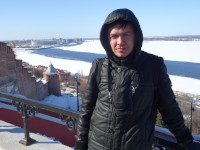 2022.03.16 On the observation ground at the top of the Chkalov Stairs, with a view to the Nizhny Novgorod Kremlin, the thawing Volga (the middle of March) and the “Nizhny Novgorod” Stadium (Russia).