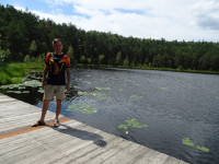 2022.07.15 On the bridges of the Moon Lake, equipped with by “Pearl” Park Hotel; standing, full-face.