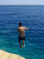 2022.08.20 I am standing on the beautiful water of the Red Sea in Hurghada (Egypt) but for some reason pinching my nose, as if I am about to fall down to the water… 🤔