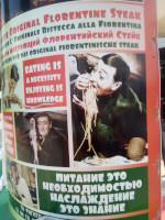 «Питание – это необходимостью». Пусть у слова «необходимость» неправильный падеж, и я не знаю, чья это цитата, но человек, похожий на Хазанова, явно «вкусно» рекламирует одно из айя-напских кафе. 😁