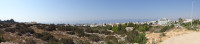Панорама Айя-Напы (Αγία Νάπα), её побережья и Средиземного моря (Μεσόγειος θάλασσα) со смотровой площадки на «верху» города. Небо и море местами сливаются!