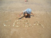 Коли братик Сева в силу своего юного возраста не смог с нами поехать отдыхать, мы решили выложить его имя на песке камушками из Красного моря.