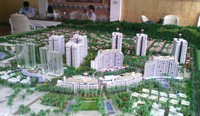 Гостинично-жилой комплекс Aloha Oceanfront Suite Resort, точнее его макет. Прозрачные корпуса ещё не построены.